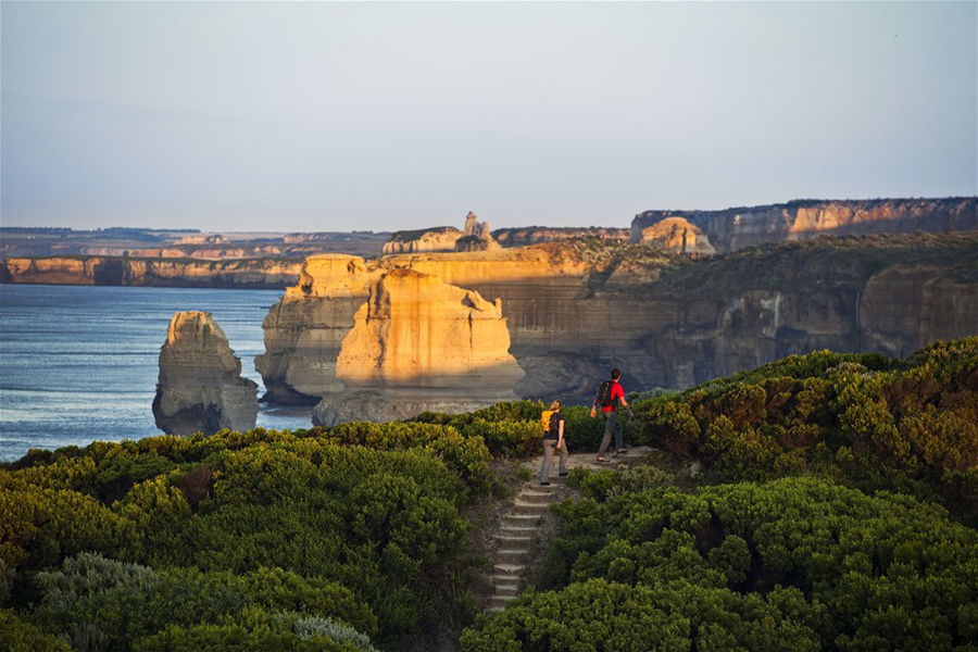 Couple hiking on the Great Ocean Walk, Great Ocean Road, Victoria, Australia