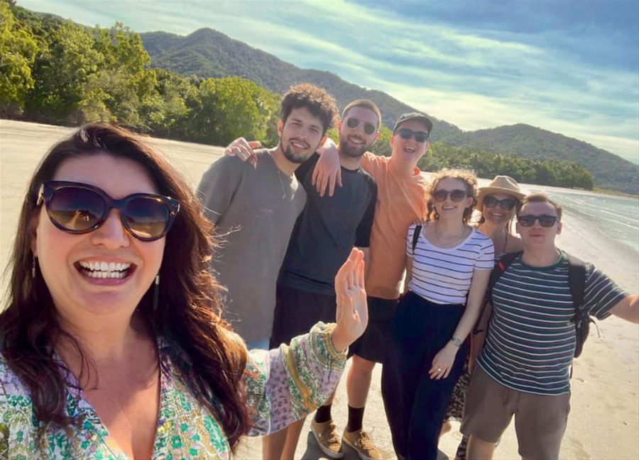 A group of consultants on Cape Tribulation beach in Queensland, Australia