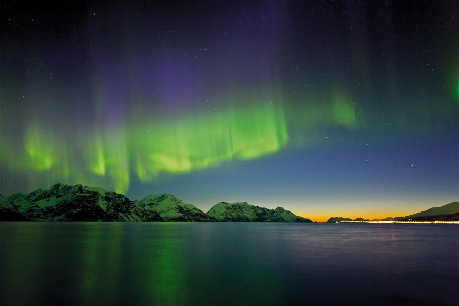 The Northern Lights illuminate the night sky in Norway