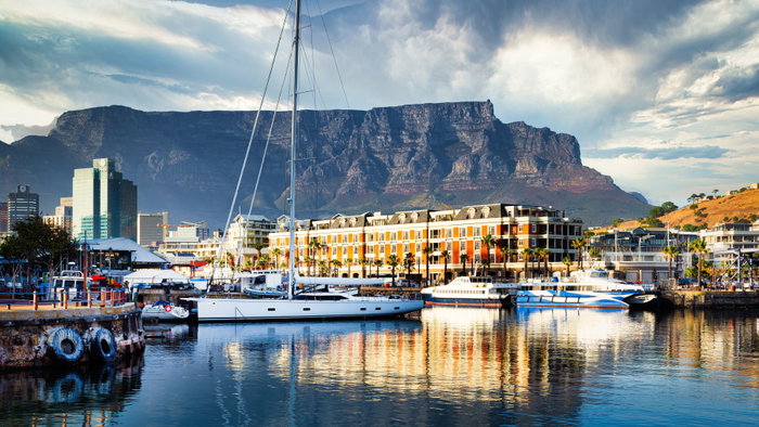 Views of Table Mountain behind the V&A Waterfront harbour in Cape Town