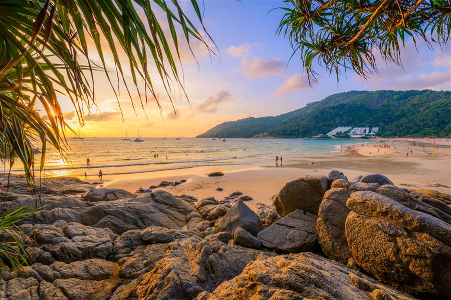 Beautiful sunset on Nai Harn Beach in the south of Phuket, Thailand