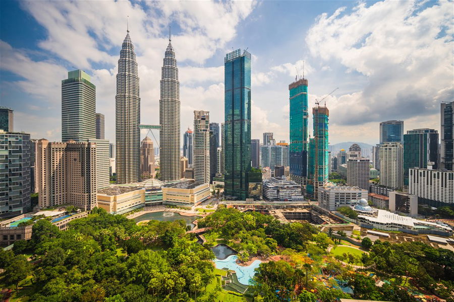 Skyscraper of Petronas Twin Towers of Kuala Lumpur along with the other buildings in Malaysia.