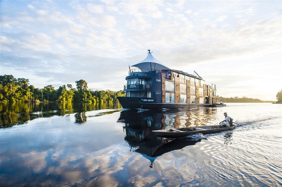 A river barge cruising down the Amazon River in South America