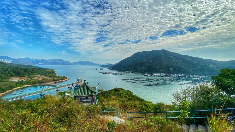 Aerial view of a temple on Lamma Island in Hong Kong with the ocean in the background