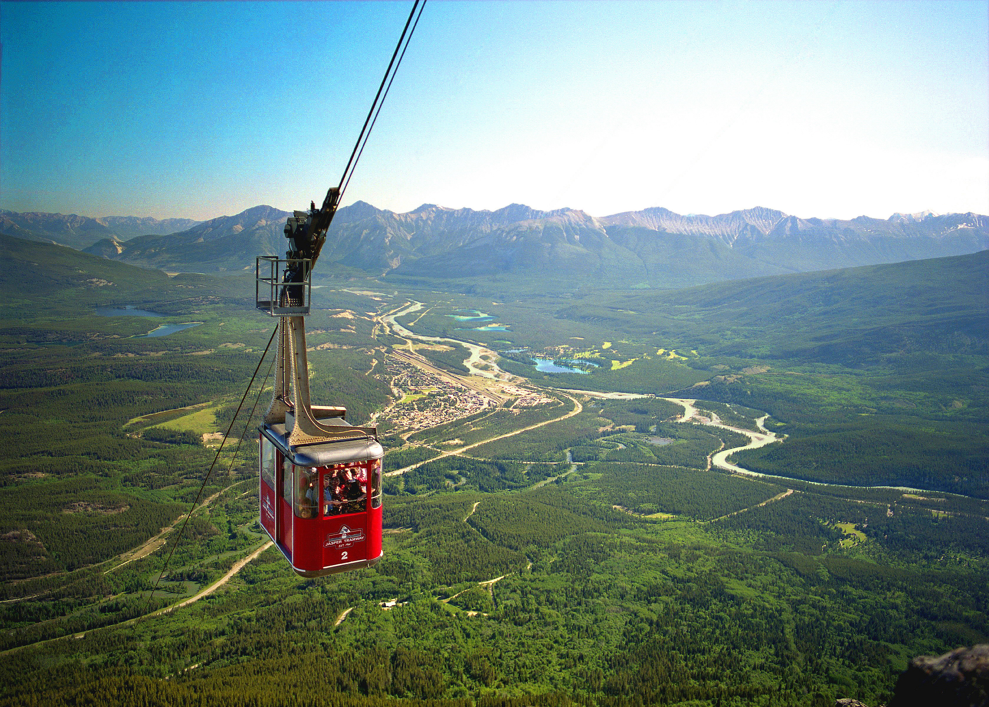 Cable car high above the vast forest and distant peaks, on Jasper SkyTram, Alberta, Canada