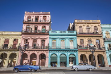 Old retro-cars parked at a street near Gran Teatro, Havana