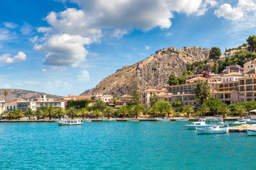 Nafplio in the Peloponnese, Greece, on a summers day framed by mountains and turquoise waters
