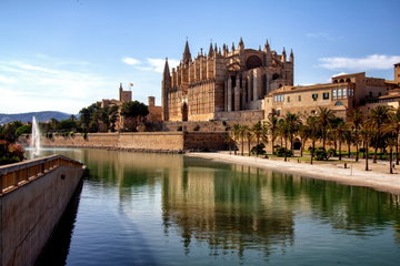 Palma Cathedral in Mallorca, Spain on a sunny day overlooking the blue Mediterranean Sea