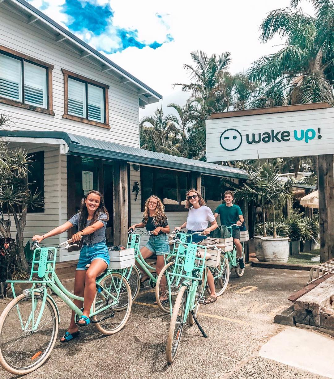 Girls with bikes outside hostel
