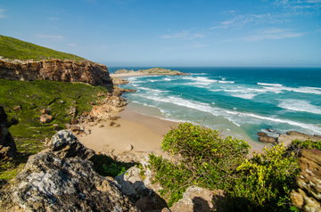 Panoramic view of turquoise ocean with gently crashing waves Robberg Nature Reserve, South Africa