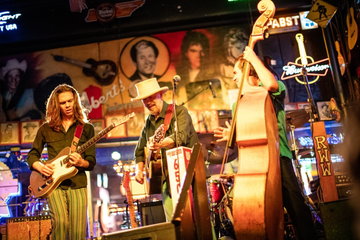 3 musicians performing at a bar in Nashville, Tennessee, USA