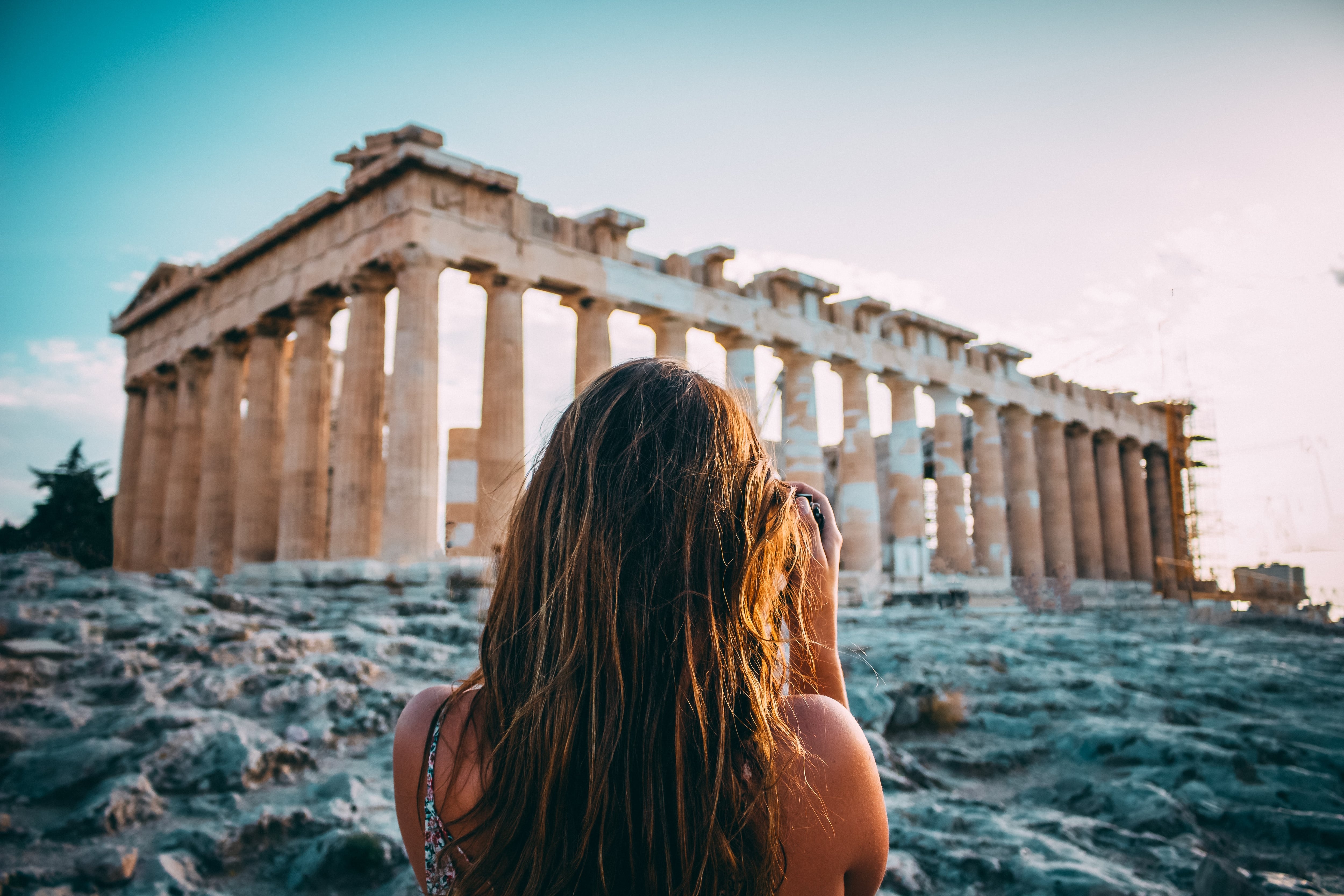Woman taking picture of Parthenon, Athens
