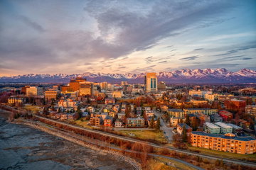 Aerial view of a sunset over downtown Anchorage during spring, Anchorage, Alaska, USA