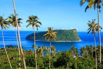 Nu'utele Island of volcanic tuff ring in deep blue waters of Pacific Ocean, scenic view from Upolu island, Samoa