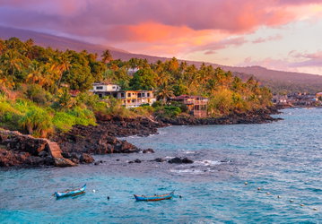 Sunset boats in holiday paradise resort on Grand Comore island, Comoros islands