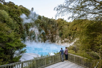 Boardwalk and steaming volcanic scenery in Rotorua New Zealand