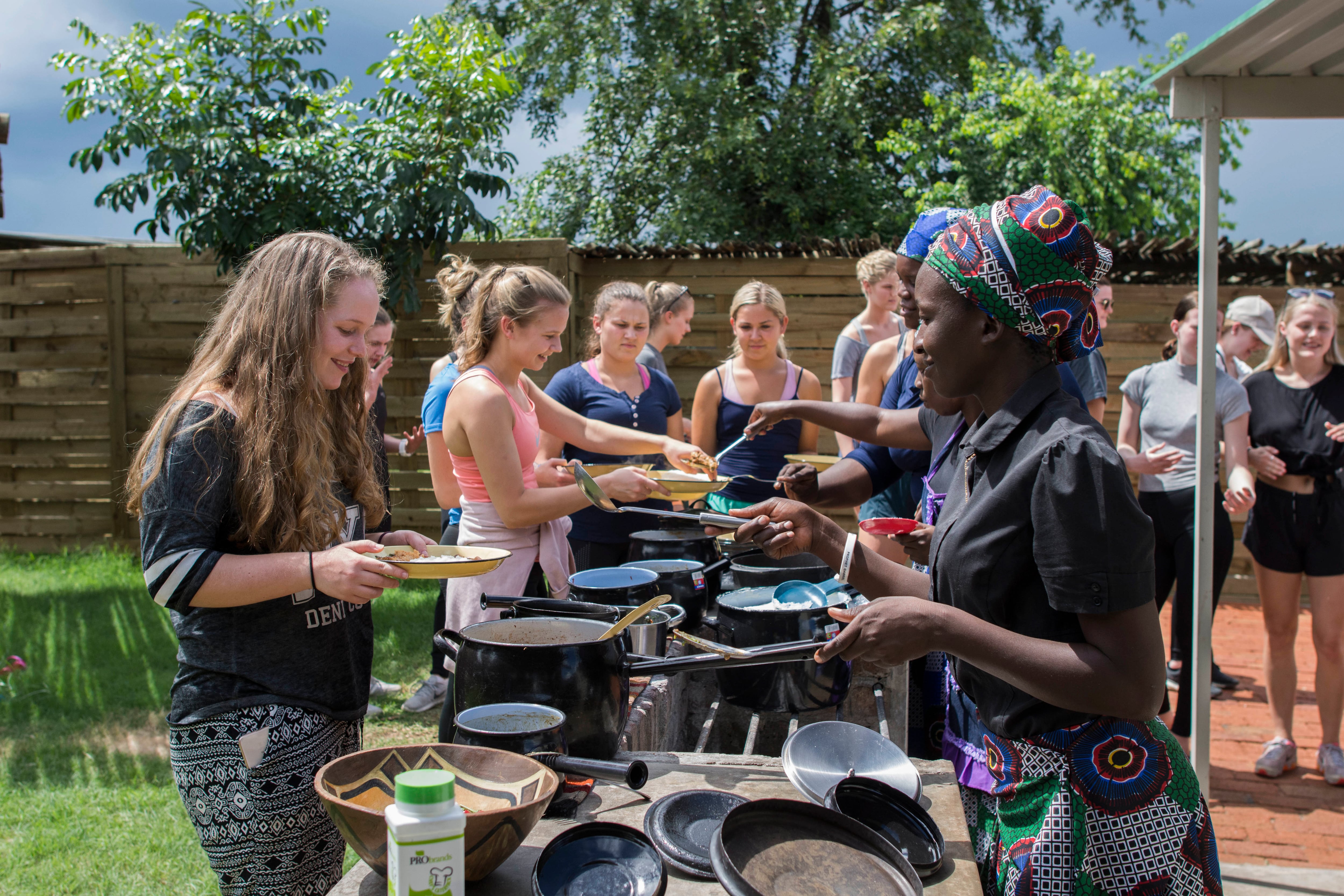 Travellers eating lunch in Africa