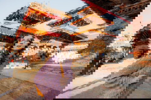 Young Caucasian woman exploring in Bhaktapur Durbar square in Kathmandu