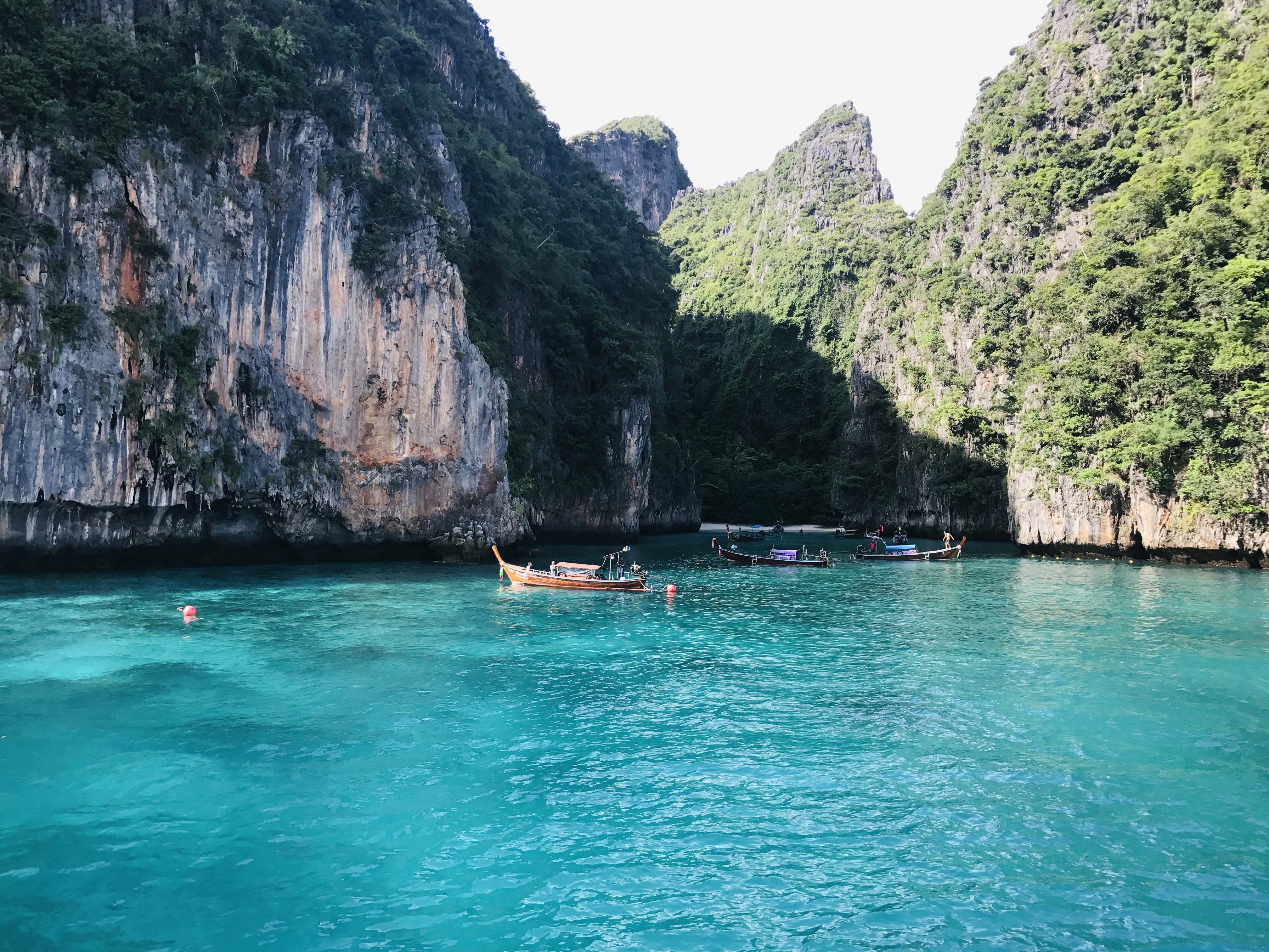 Traditional Thai boats in a bay in Thailand