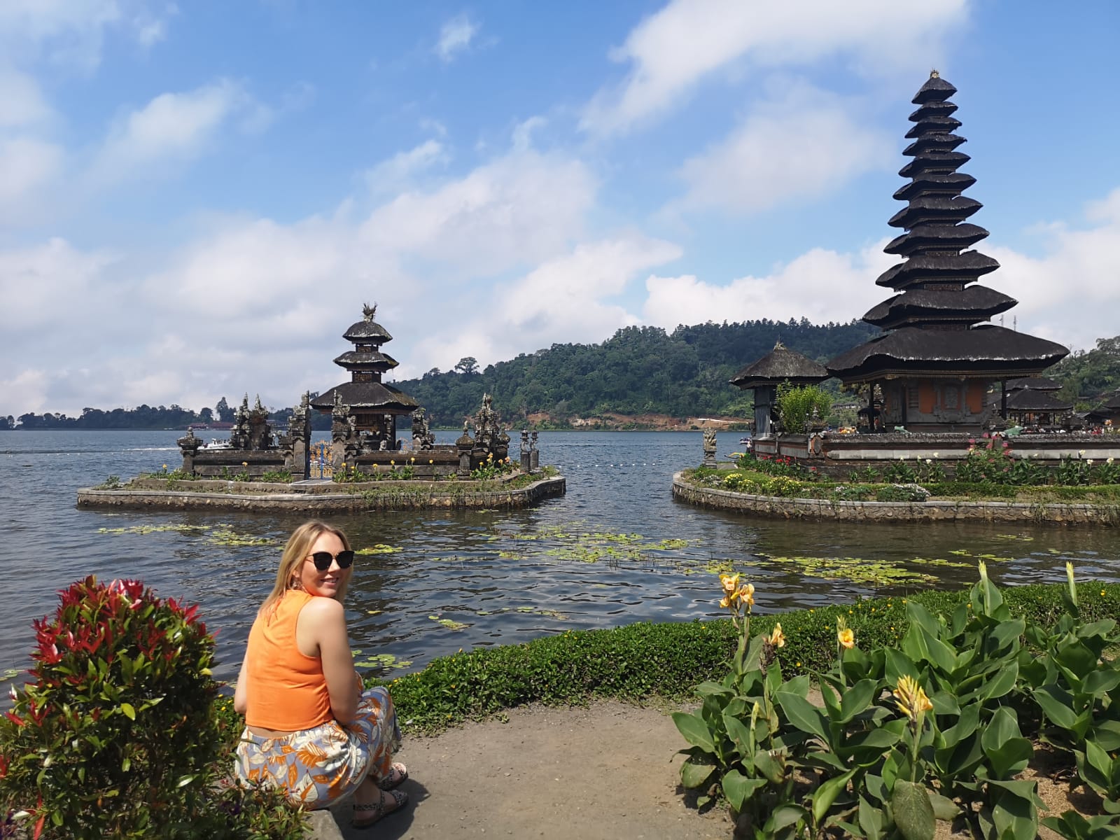 Emily stood on Seminyak Beach in Bali at sunset