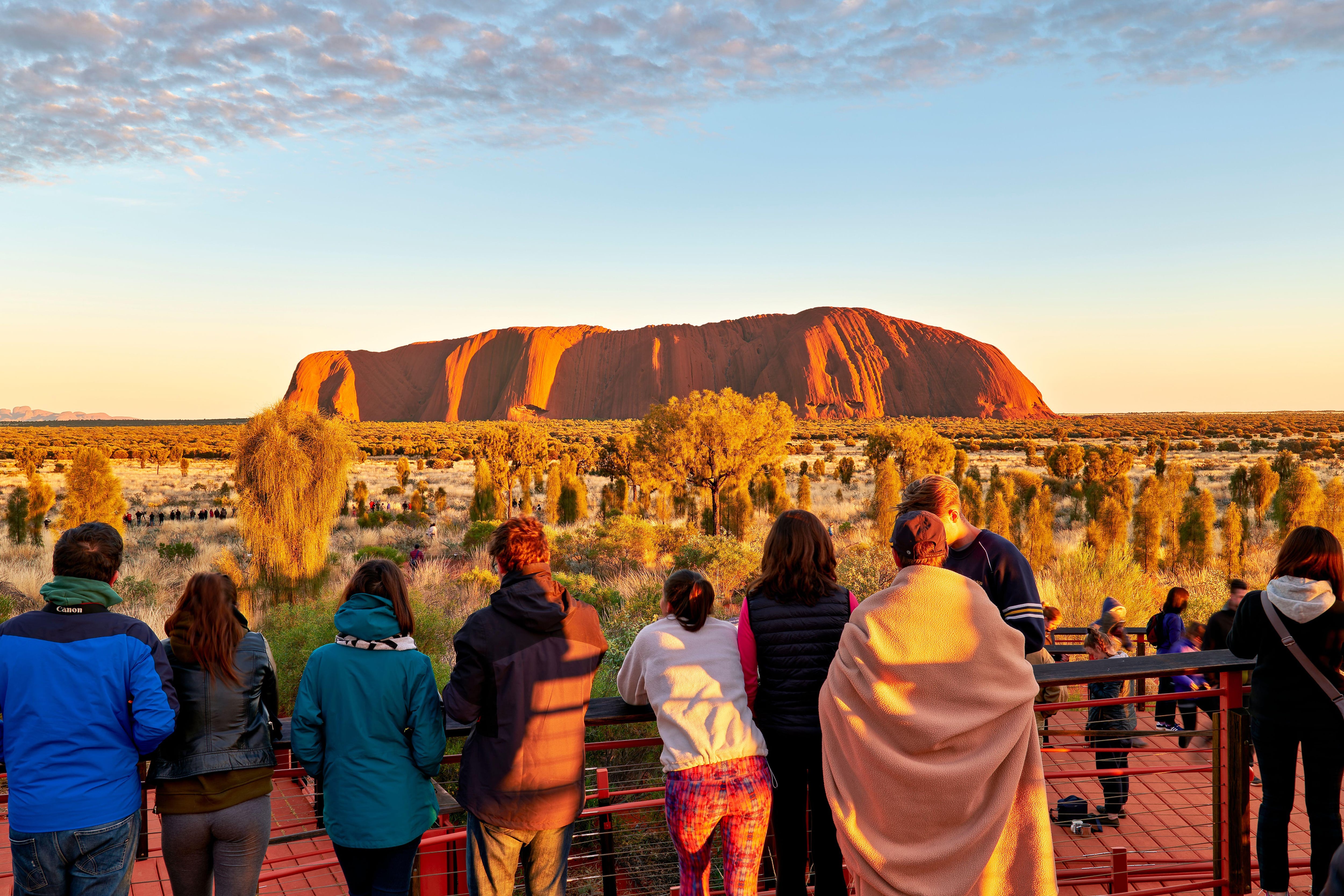 eople waiting for sunrise at Uluru Ayers Rock, Northern Territory, Australia