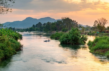 Beautiful, peaceful scene along the Mekong River, Don Det from the Old French colonial era bridge, Laos
