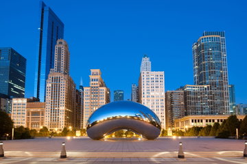 The famous ‘Bean’ sculpture reflects the sunshine across the Chicago Business District on a bright summers’ day in Illinois, USA