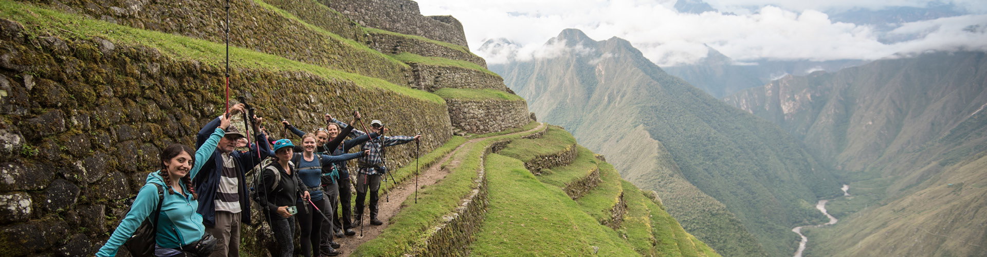 Amazing view over the ancient stone city of Machu Picchu in lush, green mountains of Peru