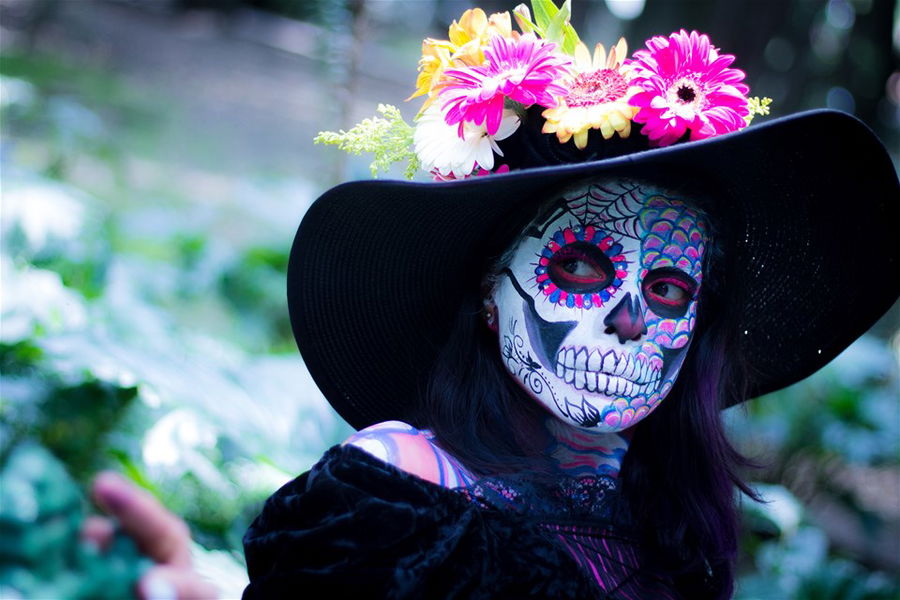 A woman in elaborate face paints for the Day of the Dead festival in Mexico