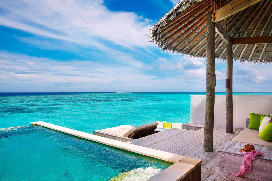 An overwater villa with a pool in the Maldives