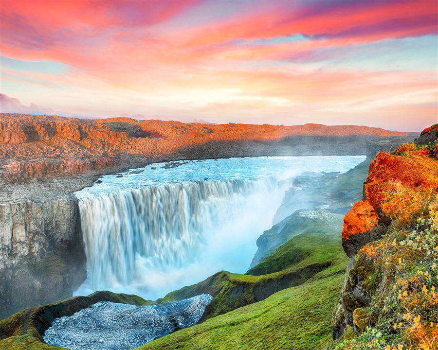 Breathtaking sunset view of the waterfall called Dettifoss in Iceland