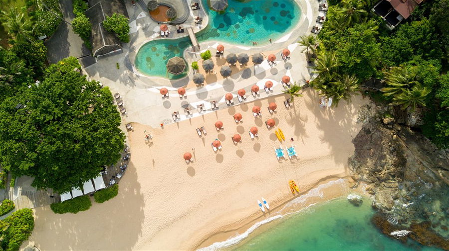 An aerial view of the beachfront pool at the Tongsai Bay resort in Koh Samui, Thailand