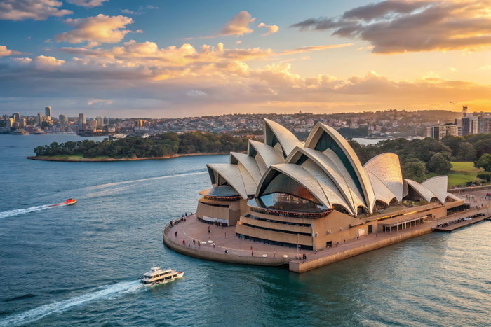Sydney Opera House at Sunset with Boats on Sydney Harbour