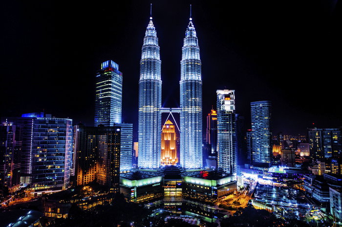 Panoramic night scene of Kuala Lumpur, Malaysia and Petronas Towers at night. Kuala Lumpur Petronas Towers Night Malaysia Urban Skyline Dusk Architecture Asia Building Exterior Built Structure Capital Cities City City Life Cityscape Downtown District Famous Place Horizontal Human Made Structure Illuminated International Landmark Modern National Landmark Nightlife No People Office Building Exterior Outdoors Photography Scenics - Nature Skyscraper Tall - High Tower Travel Travel Destinations West Malaysia 2014
