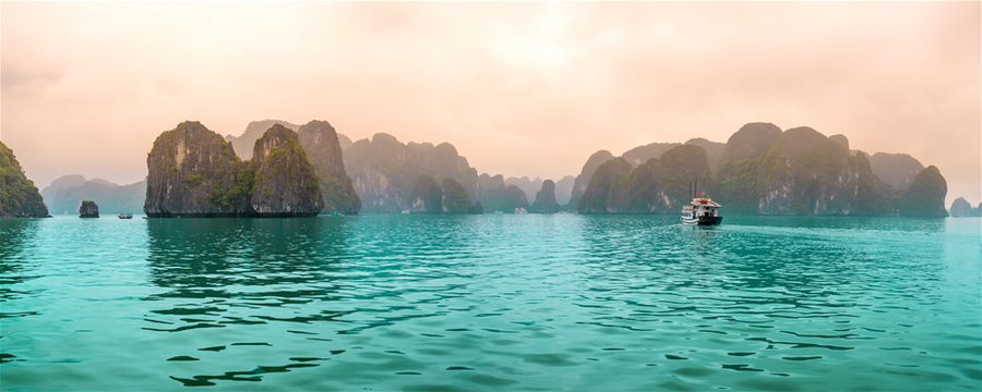 Beautiful Tourist cruise ship floating in Ha Long Bay, Vietnam