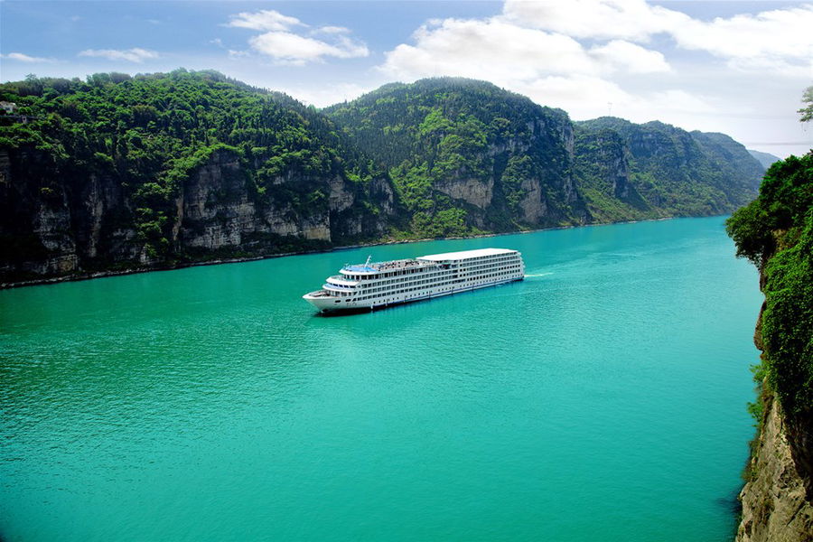 A cruise ship sails along the Yangtze River in China