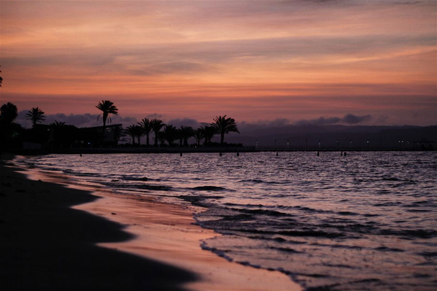 Sweeping Paracas beach in Peru at sunset