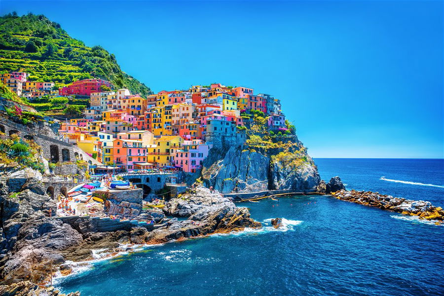 Beautiful colorful cityscape on the mountains over Mediterranean sea, Europe, Cinque Terre, traditional Italian architecture