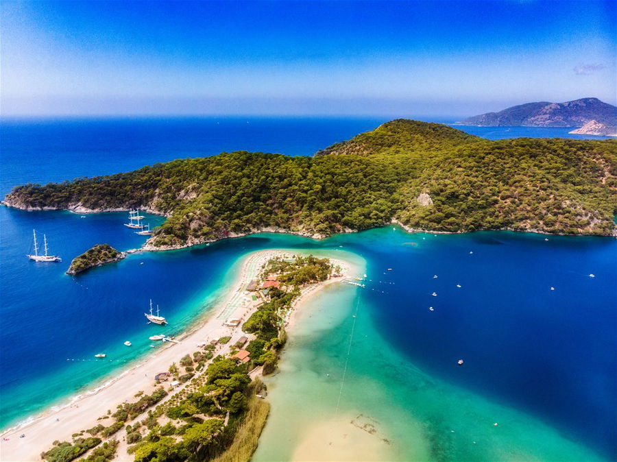 Aerial view of the stunning Oludeniz beach in Turkey surrounded by bright blue waters