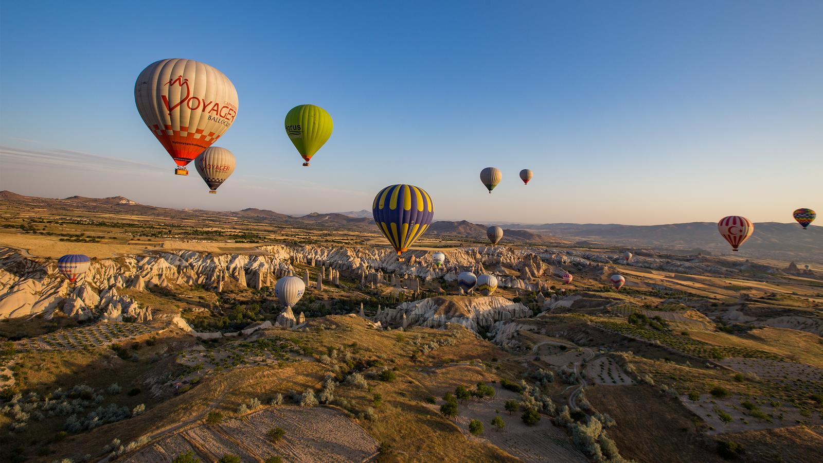 Balloons at sunrise, Goreme, Cappadocia, Anatolia, Turkey