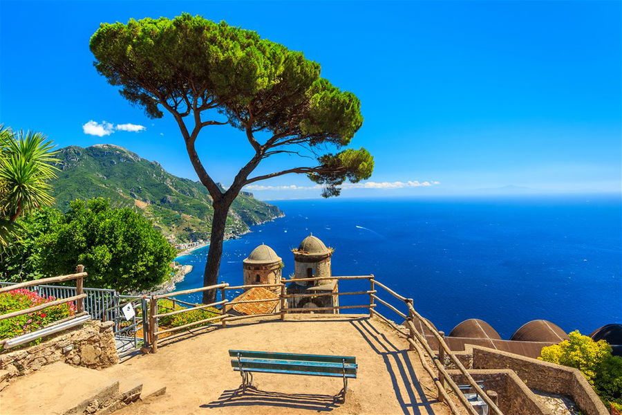 A bench overlooking the ocean on the Amalfi Coast in Italy