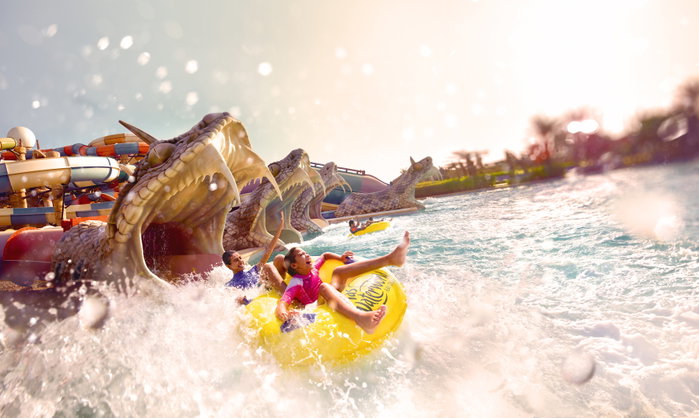 kids at the bottom of the waterslide at Yas Waterworld