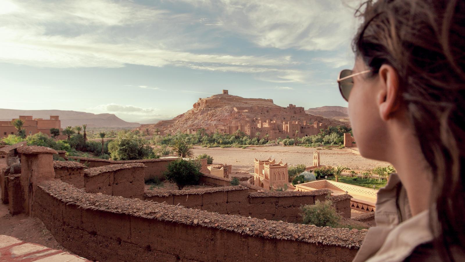Two female travellers wandering the alleyways in the Souk in Morocco